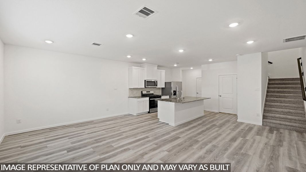 Furnished interior view inside a new home in Bridges on Lake Houston Villas, Humble (Image 7).