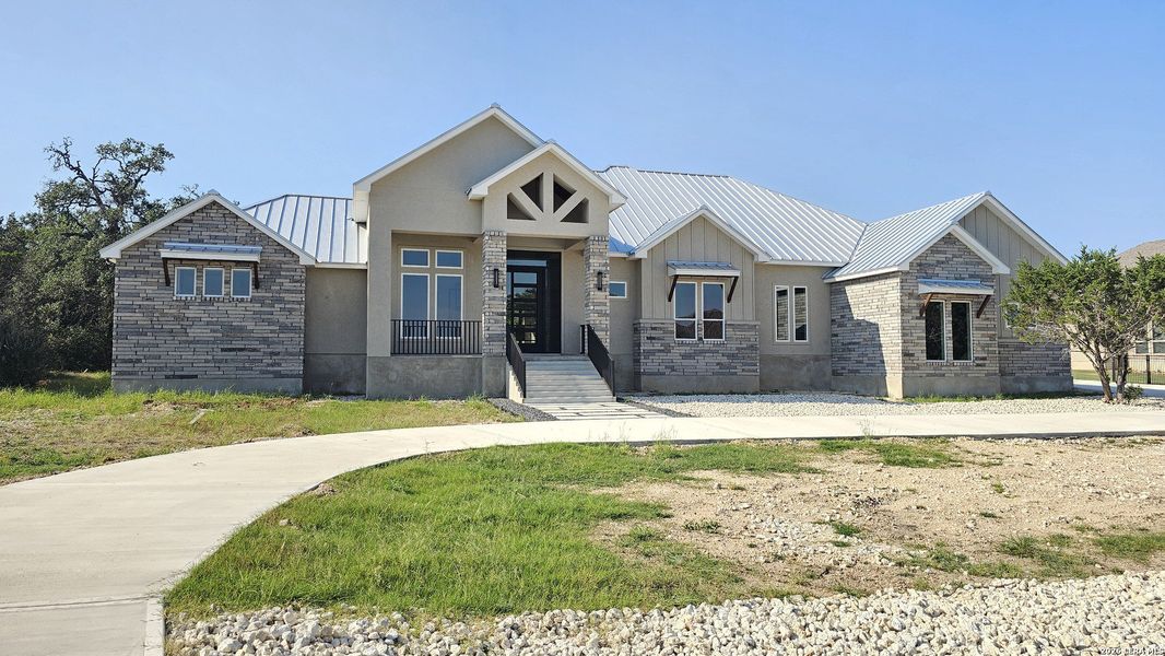 Front exterior of a new home in , New Braunfels, TX, highlighting curb appeal (Image 32).
