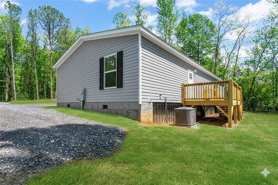 Exterior details and patio area of a home in , Ellijay (Image 2).