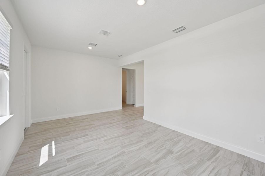Furnished interior view inside a new home in Brystol at Wylder - Reserve Series, Port St. Lucie (Image 8).