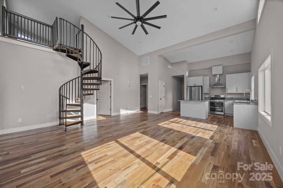 Open concept living with high ceilings