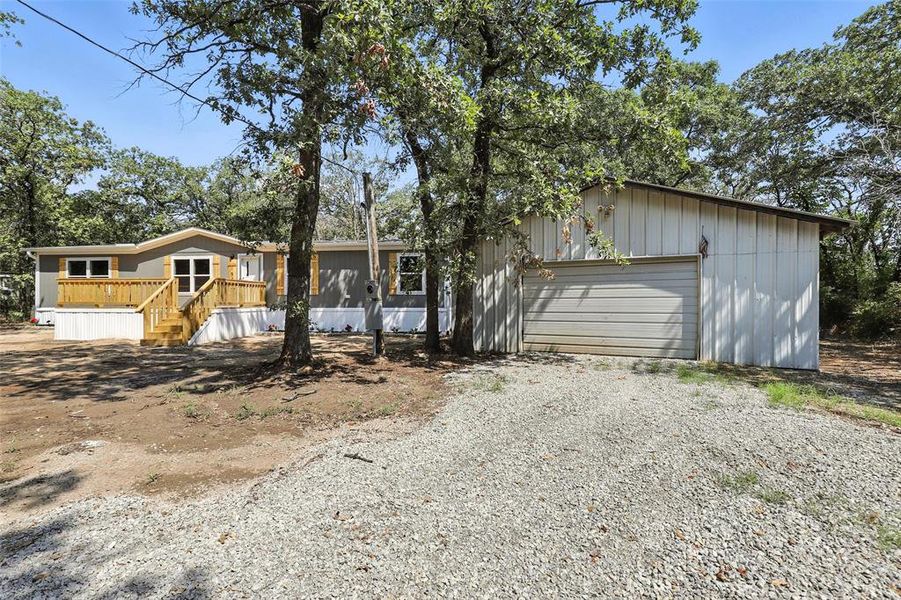 Front exterior of a new home in , Azle, TX, highlighting curb appeal (Image 26).