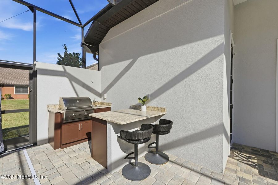 Exterior details and patio area of a home in , Palm Coast (Image 39).