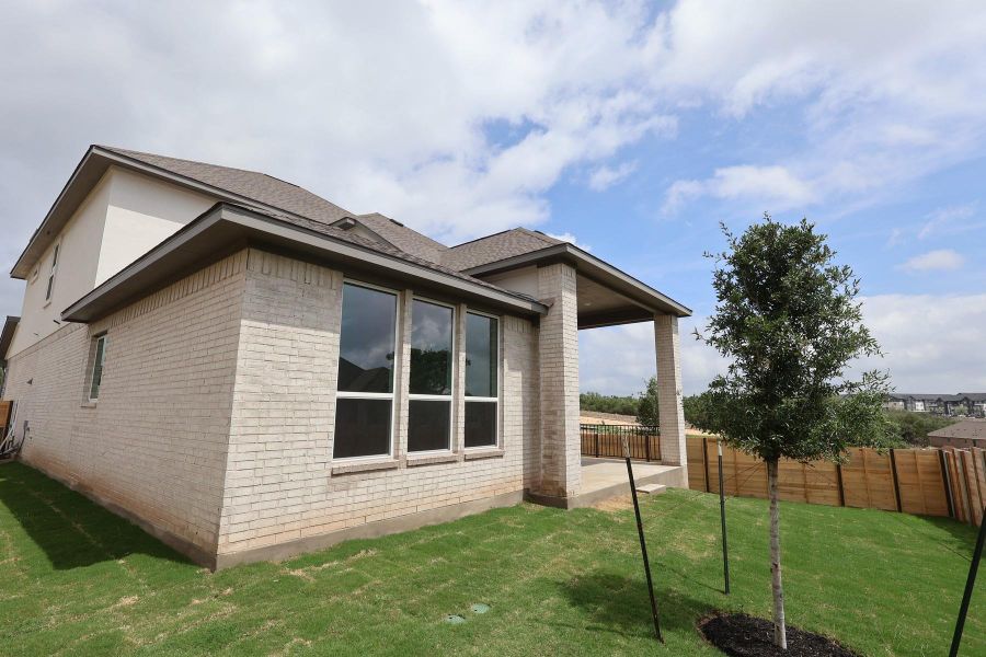 Exterior details and patio area of a home in Wolf Ranch, Georgetown (Image 3).