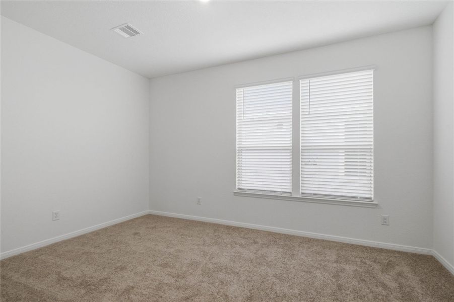 The Den offers a versatile space that seamlessly expands your living options—perfect for a home office, playroom, media space, or whatever suits your lifestyle.