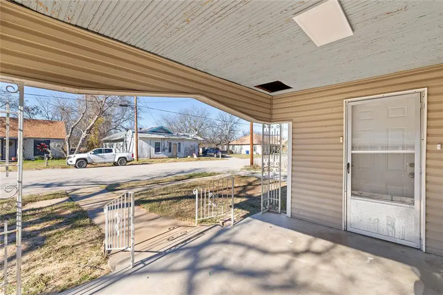 Exterior details and patio area of a home in , Brownwood (Image 12).