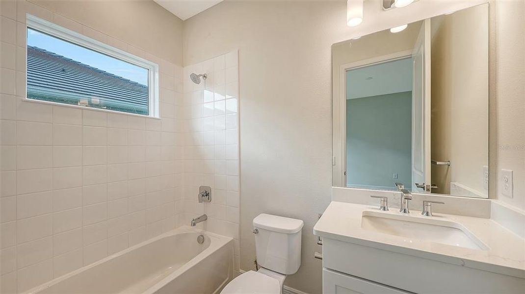 Furnished interior view inside a new home in Grand Park, Sarasota (Image 16).