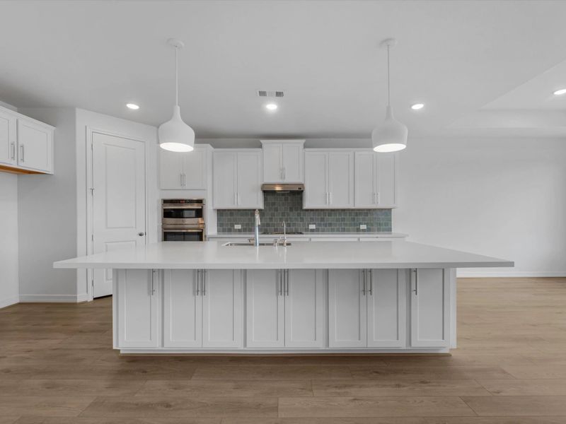 Kitchen. Sample product photo. Actual exterior and interior selections may vary by homesite. Photo may be virtually staged. Kitchen. Sample product photo. Actual exterior and interior selections may vary by homesite. Photo may be virtually staged.