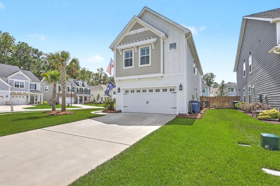 Front exterior of a new home in , Johns Island, SC, highlighting curb appeal (Image 24).