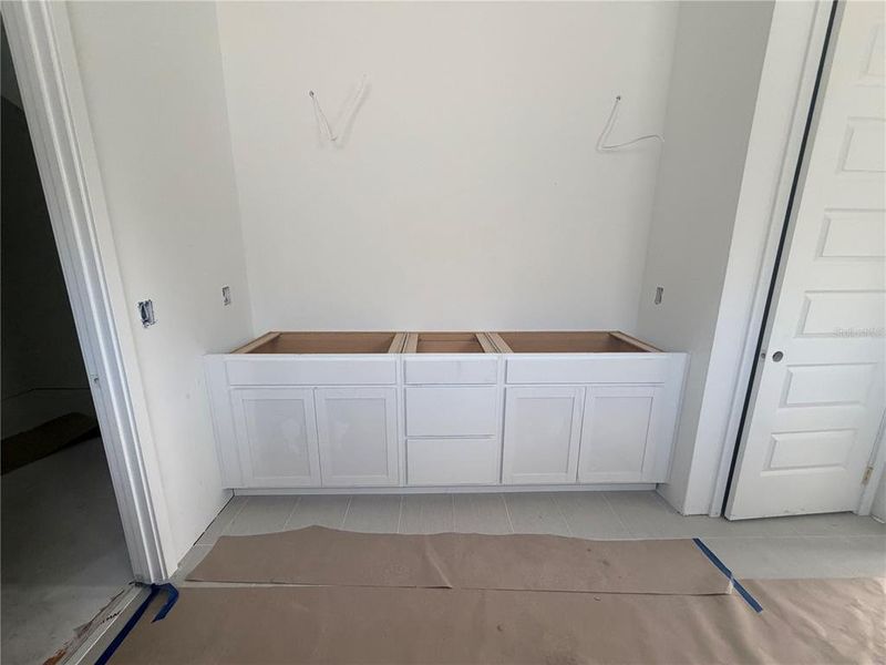In-progress construction of a new home in Northlake at Ovation, Winter Garden, FL (Image 41).