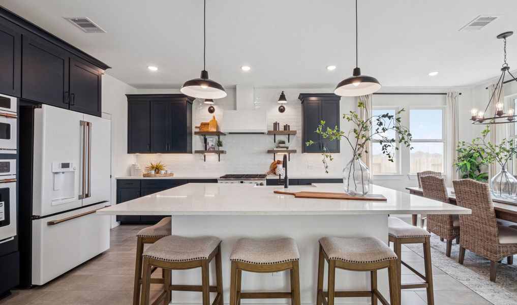 Kitchen with spacious central island & pendant lighting Kitchen with spacious central island & pendant lighting