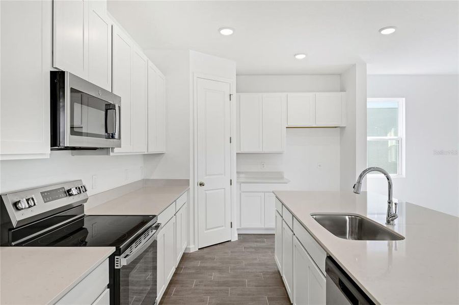 Furnished interior view inside a new home in Seasons at Shores of Lake Dell, Dundee (Image 5).