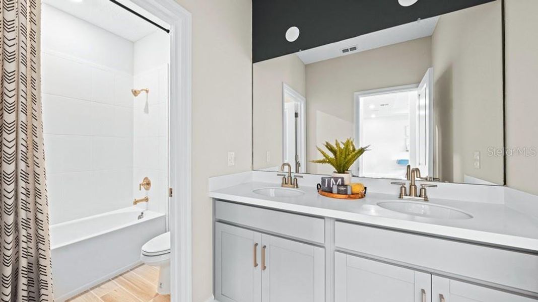 Furnished interior view inside a new home in Palms at Coasterra, Palmetto (Image 9). Furnished interior view inside a new home in Palms at Coasterra, Palmetto (Image 9).