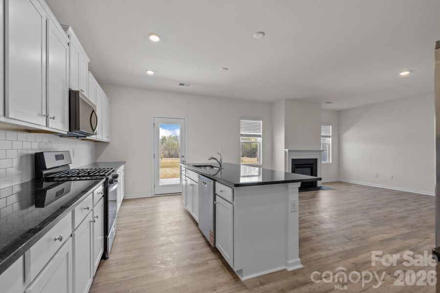 Furnished interior view inside a new home in McFarland Estates, York (Image 6).