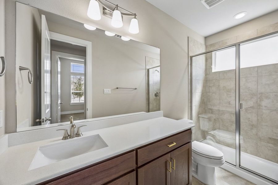 Representative furnished interior of a home built from the The Mockingbird by Lillian Custom Homes in Polo Ridge, Forney (Image 8).