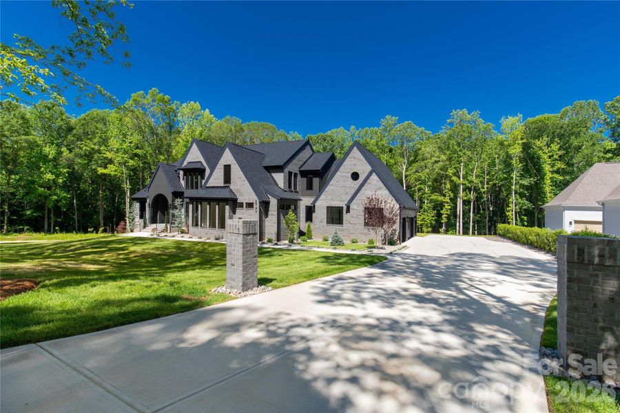 Front exterior of a new home in , Indian Land, SC, highlighting curb appeal (Image 27).
