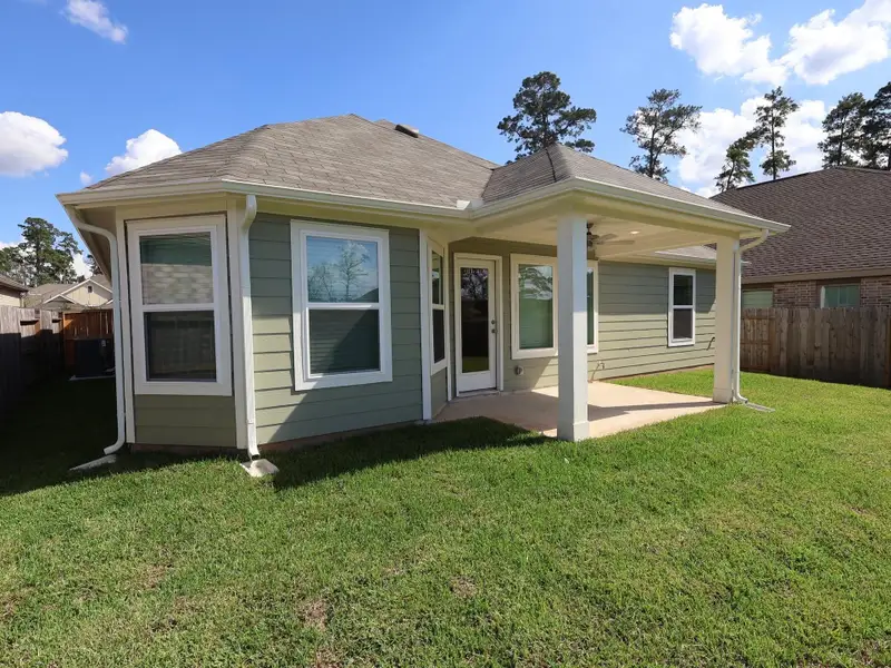 Exterior details and patio area of a home in Moran Ranch, Willis (Image 3). Exterior details and patio area of a home in Moran Ranch, Willis (Image 3).