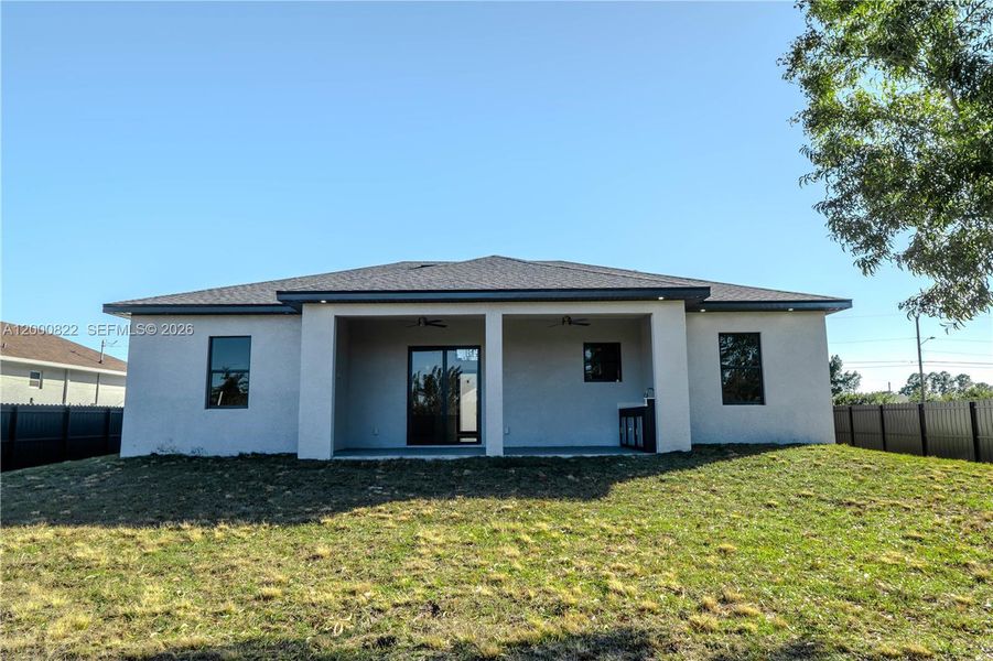 Exterior details and patio area of a home in , Lehigh Acres (Image 18). Exterior details and patio area of a home in , Lehigh Acres (Image 18).