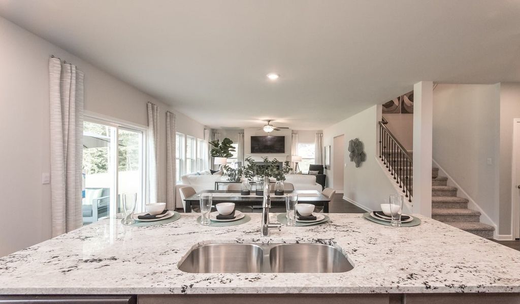 The spacious kitchen island overlooks the dining area and great room.