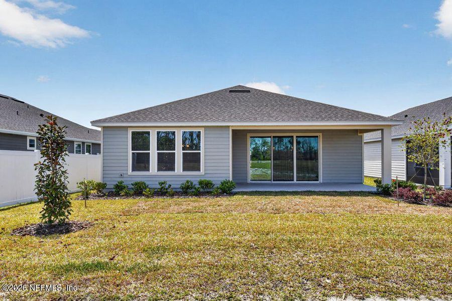 Exterior details and patio area of a home in Colbert Landings, Palm Coast (Image 18).