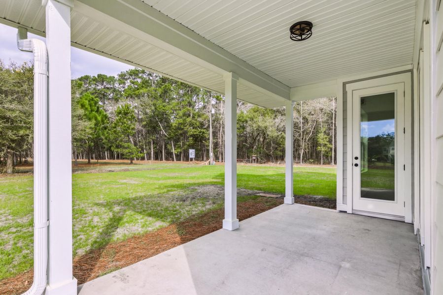 Exterior details and patio area of a home in , Johns Island (Image 32).