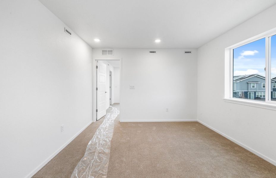 Spacious, unfurnished interior of a new home in Painted Prairie, Aurora (Image 19).