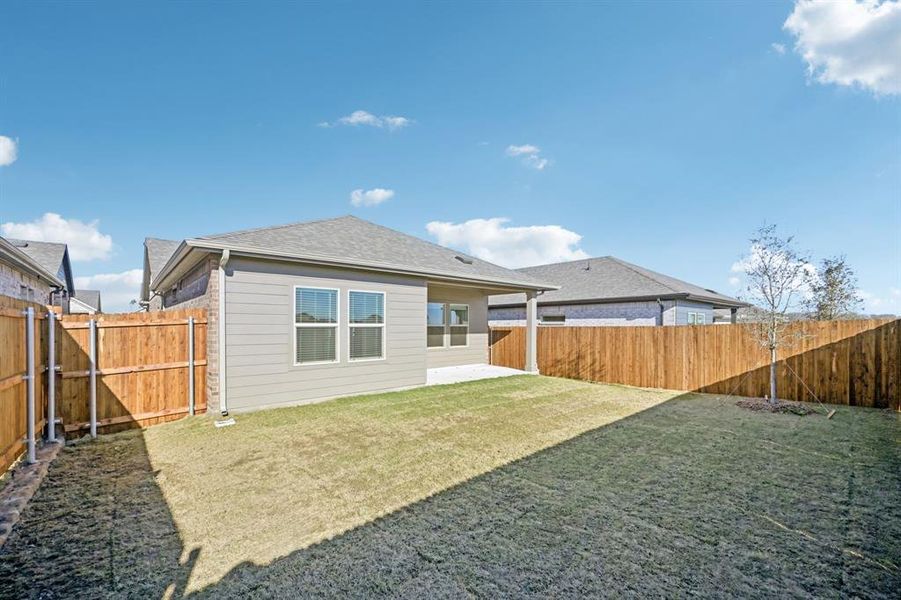 Exterior details and patio area of a home in Eastridge - Spring Series, McKinney (Image 24).