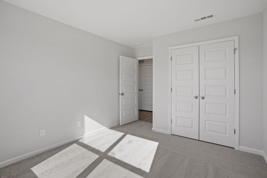 Spacious, unfurnished interior of a new home in Renaissance at White Oak, Garner (Image 26).