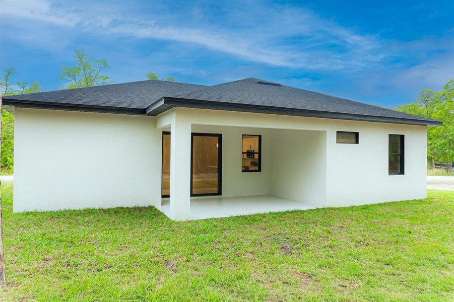 Exterior details and patio area of a home in , Brooksville (Image 21).