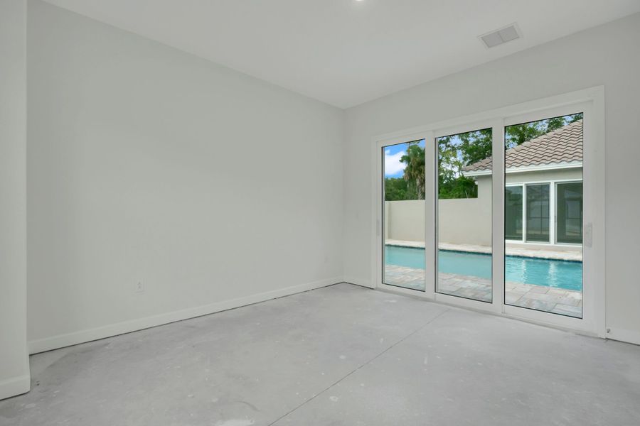 Representative unfurnished interior of a home built from the The Courtyard Junior by ABD Development in Toscana, Palm Coast (Image 14).