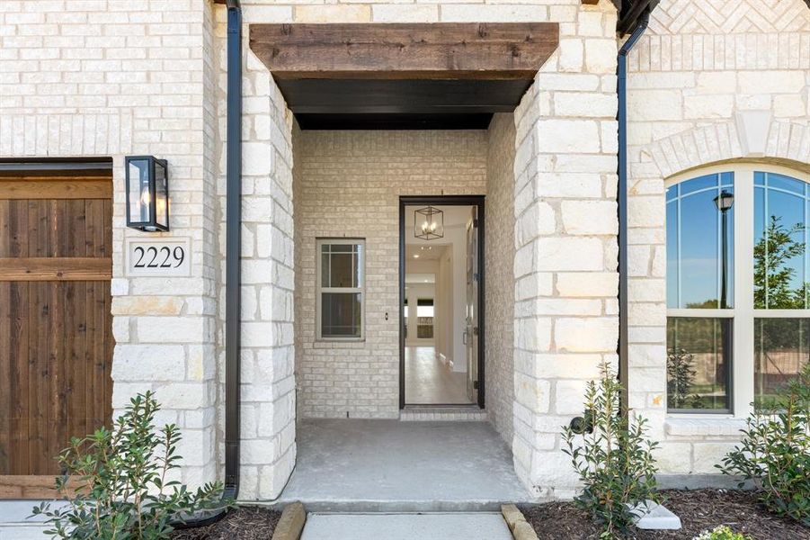 Exterior details and patio area of a home in Stone River Glen 60s, Royse City (Image 24). Exterior details and patio area of a home in Stone River Glen 60s, Royse City (Image 24).