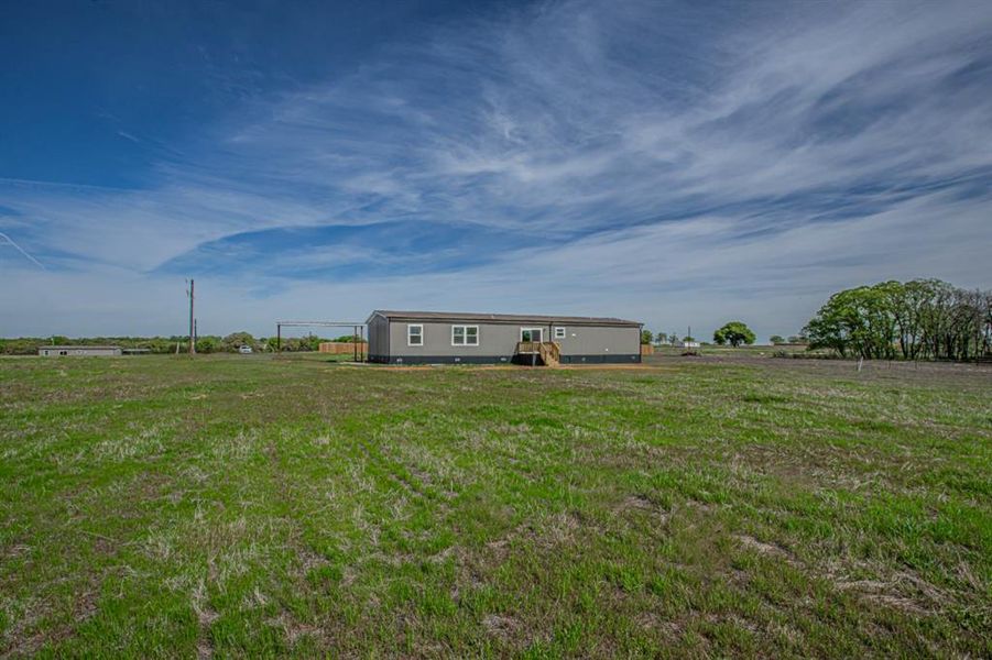 Exterior details and patio area of a home in , Sunset (Image 20).
