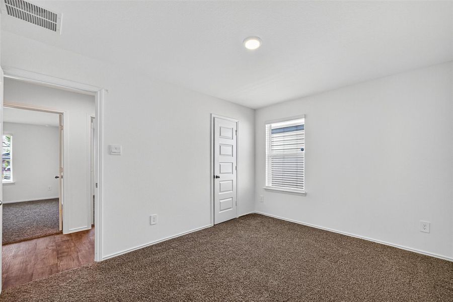 Spacious, unfurnished interior of a new home in Windstone on the Prairie, Richmond (Image 46).