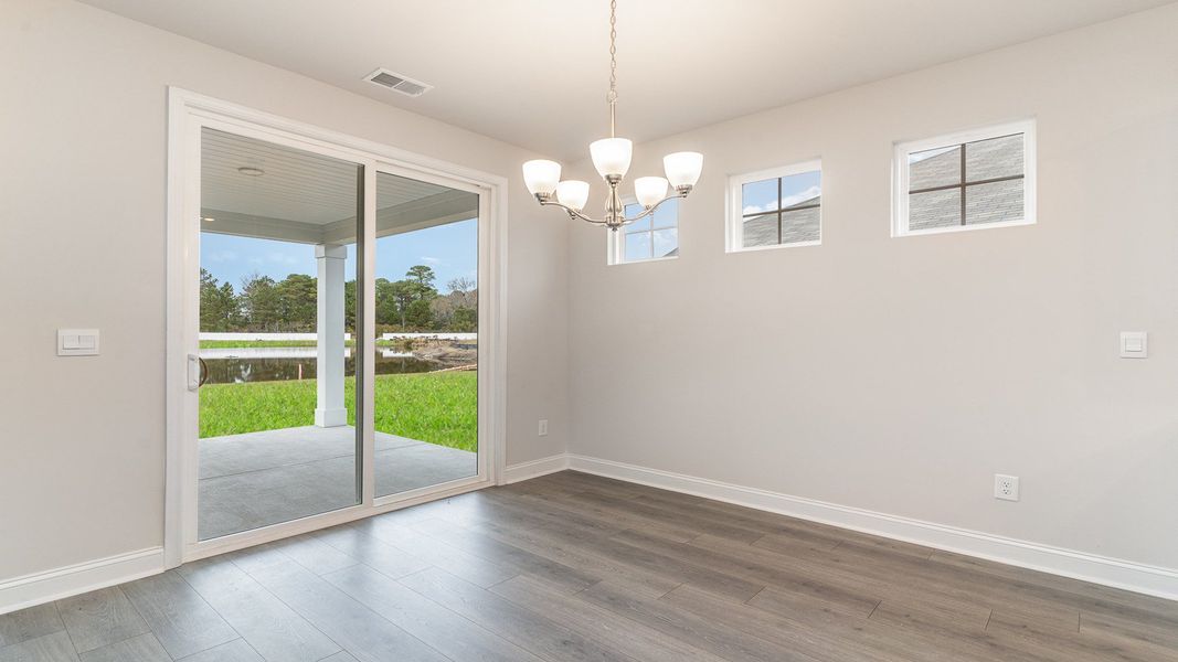 Representative unfurnished interior of a home built from the DARBY by D.R. Horton in Spring View Landing, Loris (Image 15).