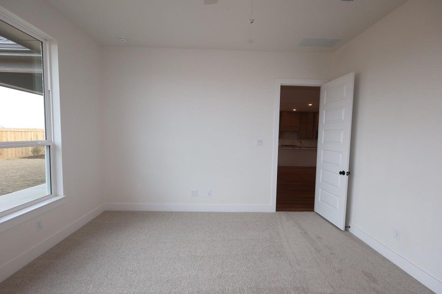 Spacious, unfurnished interior of a new home in Dunham Pointe, Cypress (Image 13).
