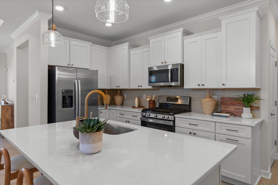Representative furnished interior of a home built from the The Sunflower by Chesapeake Homes in Coastal Club of the Carolinas, Calabash (Image 6).