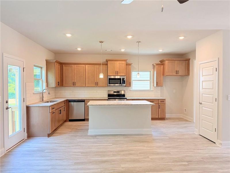 Furnished interior view inside a new home in Magnolia Villas, Cornelia (Image 9).