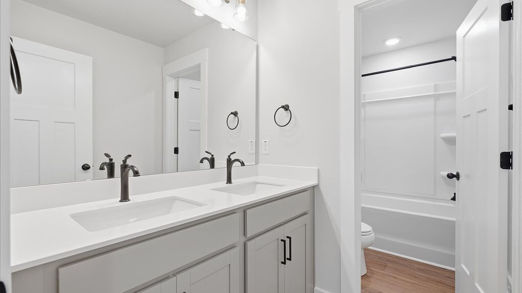 Refined hall bath with elevated finishes and a highly functional layout in Piedmont, SC Refined hall bath with elevated finishes and a highly functional layout in Piedmont, SC