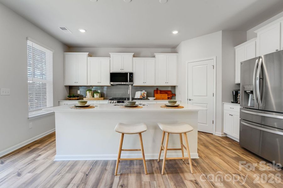 Furnished interior view inside a new home in Village of Waxhaw, Waxhaw (Image 6).