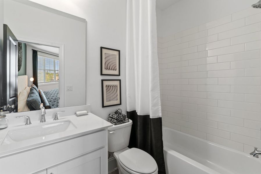 Representative furnished interior of a home built from the The Barnsley I by The Providence Group in IveyBrooke, Alpharetta (Image 32).