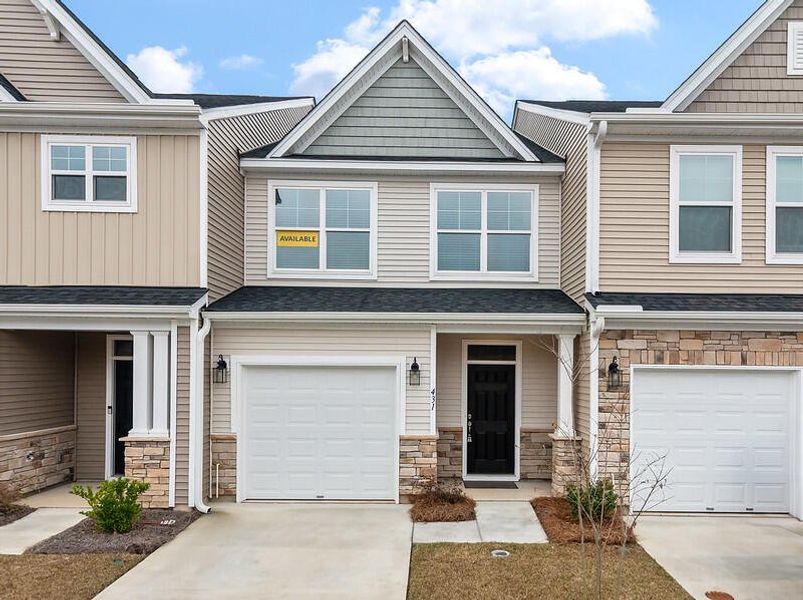 Front exterior of a new home in The Landings at Montague, Goose Creek, SC, highlighting curb appeal (Image 1).