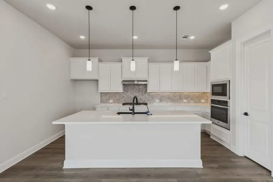 Representative furnished interior of a home built from the Aubrey by Chesmar Homes in Talia, Mesquite (Image 3).