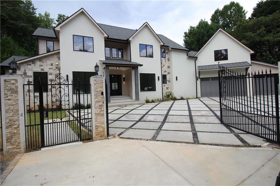 Front exterior of a new home in , Sandy Springs, GA, highlighting curb appeal (Image 29). Front exterior of a new home in , Sandy Springs, GA, highlighting curb appeal (Image 29).