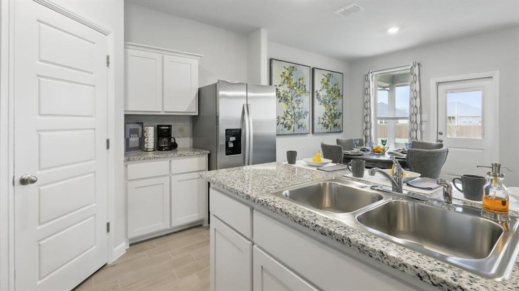 Furnished interior view inside a new home in Monarch at the Meadows, Denton (Image 32). Furnished interior view inside a new home in Monarch at the Meadows, Denton (Image 32).