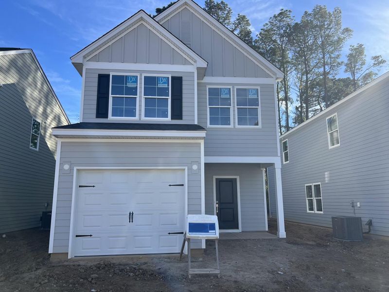 Front exterior of a new home in Central Creek, Goose Creek, SC, highlighting curb appeal (Image 18).
