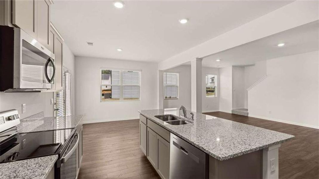 Furnished interior view inside a new home in Oakchase at Hampton, Hampton (Image 12).