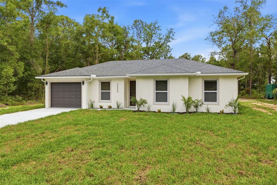 Front exterior of a new home in , Crystal River, FL, highlighting curb appeal (Image 17).