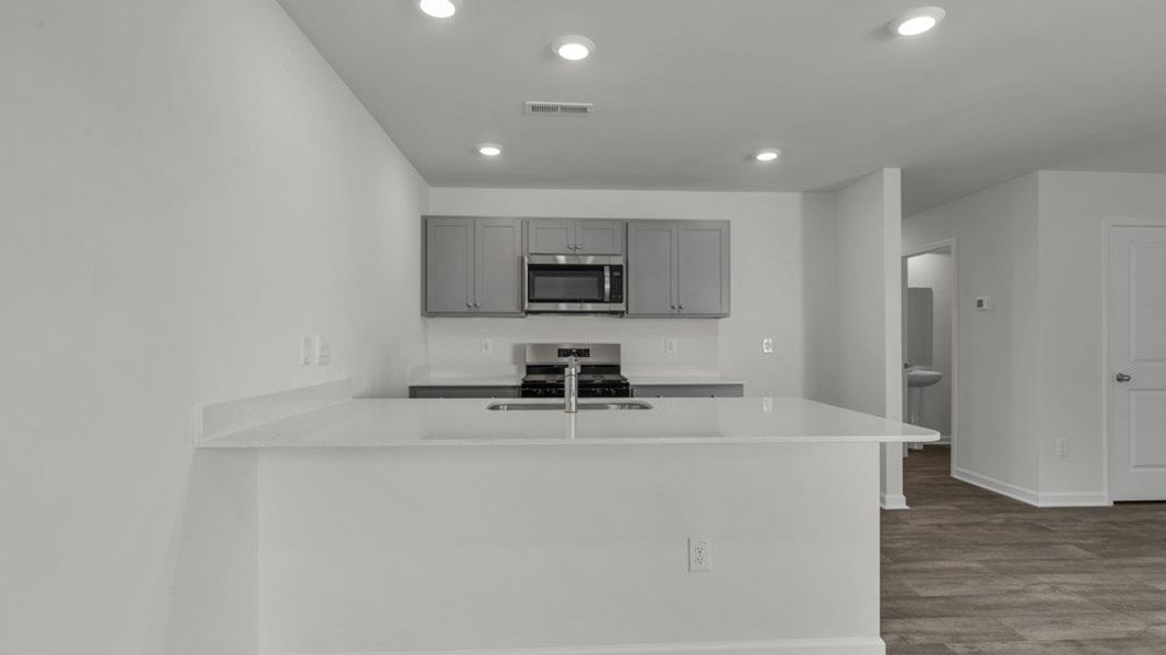 Furnished interior view inside a new home in The Townes at Honeycutt Oaks, Angier (Image 5). Furnished interior view inside a new home in The Townes at Honeycutt Oaks, Angier (Image 5).