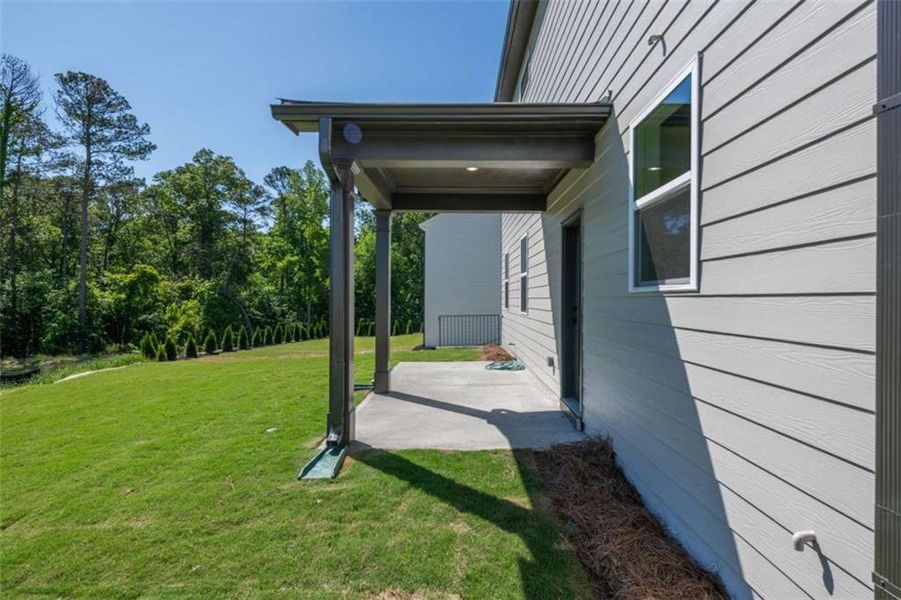 Exterior details and patio area of a home in Cambridge at Steels Bridge, Canton (Image 23).
