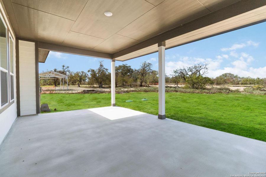 Exterior details and patio area of a home in Jordan's Ranch, San Antonio (Image 22).
